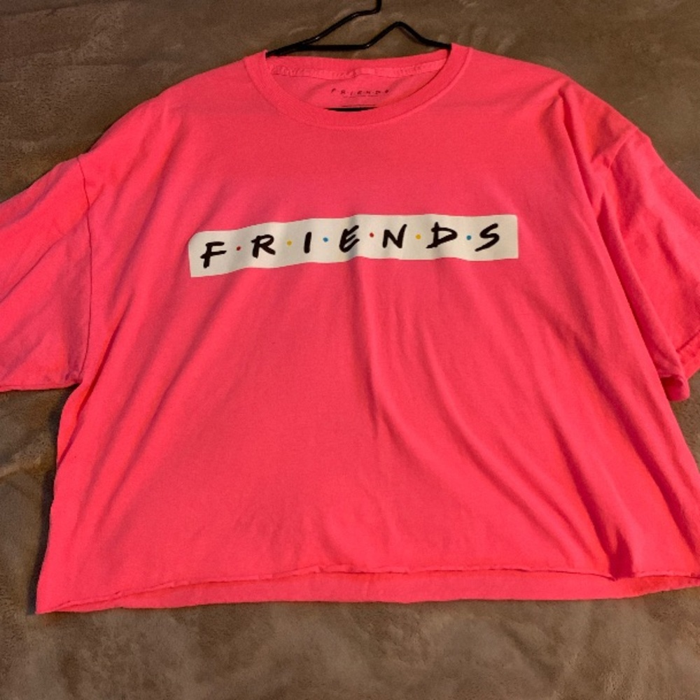 A pink f.r.i.e.n.d.s crop top